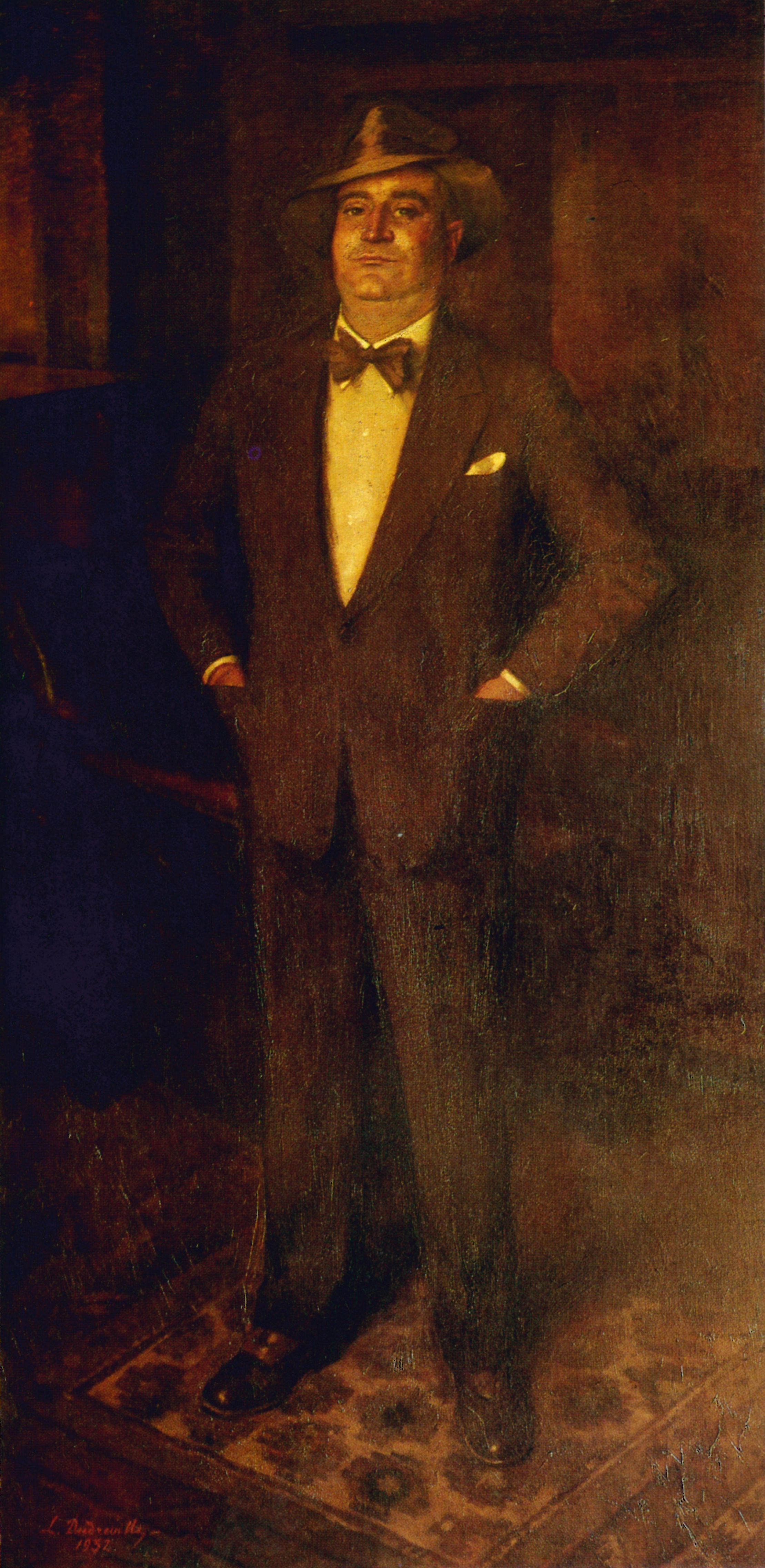 Leonardo Dudreville, titolo: Ritratto di Angelo Rizzoli, 1932. Ritratto di Angelo Rizzoli in piedi con le mani in tasca